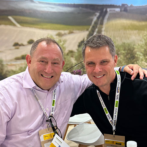 2 men smiling together